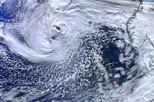 Weather: a satellite image of clouds above the earth