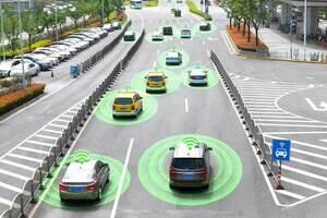 Future of transportation image with electronic cars on a main road with green circles virtual signals coming out from each car. To show e-mobility and sustainable transportation.