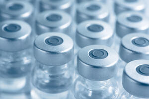 Closeup of vials of vaccine.